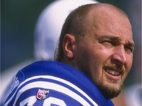 Offensive lineman Tony Mandarich of the Indianapolis Colts looks on during the Hall of Fame Game against the New Orleans Saints in Canton, Ohio.  The Colts won the game, 10-3.