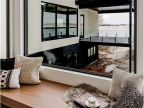 The Hospital Home Lottery grand prize show home in Greenbryre Estates provides plenty of space to take in the breath-taking scenery. This window seat overlooks one of the covered decks and the prairie beyond.