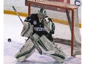 Huskies goalie Jessica Vance goes to make a save during the game at Rutherford Rink in Saskatoon on Saturday, February 24, 2018.