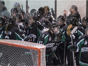 University of Saskatchewan Huskies celebrate after a win against the UBC Thunderbirds in the Canada West conference semifinal at Rutherford Rink in Saskatoon on Saturday, February 24, 2018.