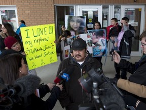 Jeffery Longman stands outside provincial court Tuesday afternoon after a judge ruled the killer of his grandson, baby Nikosis Jace Cantre, will be sentenced as an adult.