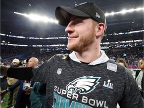 Carson Wentz #11 of the Philadelphia Eagles celebrates after defeating the New England Patriots 41-33 in Super Bowl LII at U.S. Bank Stadium on February 4, 2018 in Minneapolis, Minnesota.
