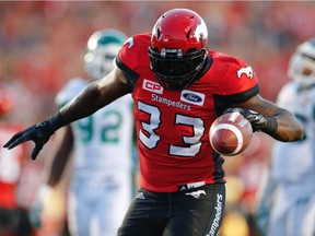 Jerome Messam, shown scoring a touchdown with the Calgary Stampeders last season, has signed as a free agent with the Saskatchewan Roughriders.
