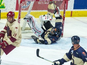 Netminder Ed Staniowski makes an old-school save during the All-Star Celebrity Classic at the Brandt Centre on Saturday.