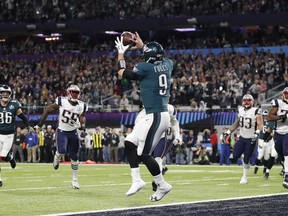 Philadelphia Eagles' Nick Foles catches a touchdown pass during the first half of the NFL Super Bowl 52 football game against the New England Patriots Sunday, Feb. 4, 2018, in Minneapolis.