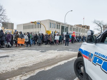 Police were present as protestors gathered and marched along Victoria Avenue outside of Regina's Queen's Bench Court on Feb. 10, 2018, the day after Gerald Stanley was acquitted of all charges relating to the shooting death of Colten Boushie.