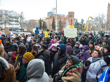 Protesters stand outside of Regina's Queen's Bench Court on Feb. 10, 2018, the day after Gerald Stanley was acquitted of all charges relating to the shooting death of Colten Boushie.