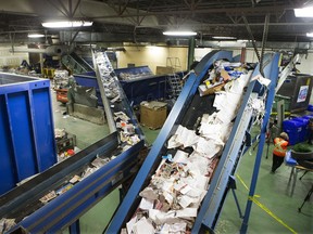 The City of Saskatoon could soon remove plastic bags from the list of acceptable items for its recycling collection programs if city council approves. This November 2014 photo shows the interior of the Cosmopolitan Industries Ltd. recycling depot.