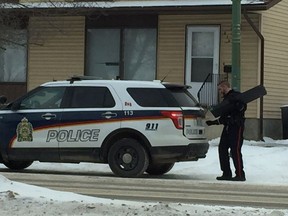 Two men are in custody after Saskatoon police seized an unlicensed rifle and shotgun from a home in the 400 block of Lenore Drive on Saturday, Feb. 17, 2018. (Cam Fuller/Saskatoon StarPhoenix)