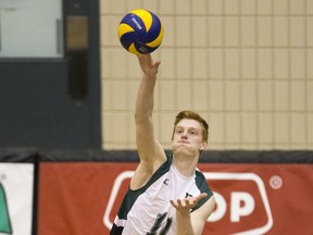 University of Saskatchewan Huskies setter CJ Gavlas serves against the University of Regina Cougars in CIS Men's Volleyball action on Saturday, February 20th, 2016.