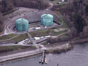 Kinder Morgan Trans Mountain Expansion Project's Westeridge loading dock is seen in Burnaby, B.C., in a November 25, 2016, file photo. Scotiabank says the current discount to Canadian crude because of a lack of oil pipeline space is costing the economy roughly $15.6 billion a year.