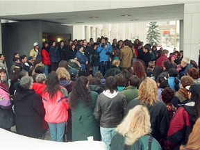 A crowd of some 300 people, including those from aboriginal, anti-racism and women's groups, gathered in front of Regina Court of Queen's Bench to hold a vigil before the sentencing of Alexander Ternowetsky and Steven Kummerfield, who were convicted of manslaughter in the death of Pamela George. Speaking at the centre of the crowd in blue is elder Mike Pinay.