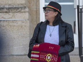 Debbie Baptiste, the mother of Colten Boushie, leaves the Court of Queen's Bench during a lunch recess as the jury is in deliberation in the trial of Gerald Stanley, the farmer accused of killing 22-year-old Indigenous man Colten Boushie, in Battleford, Sask. Friday, February 9, 2018.