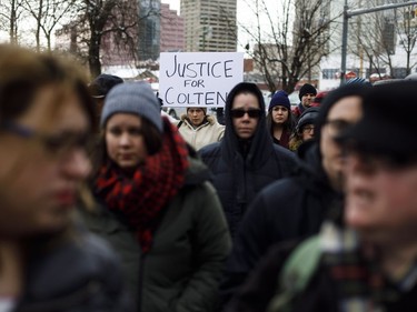 People gather during a rally in response to Gerald Stanley's acquittal in the shooting death of Colton Boushie in Edmonton, Alta., on Saturday, February 10, 2018.