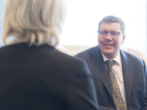 Premier-designate Scott Moe speaks with Lt.-Gov. Vaughn Solomon Schofield at Government House. The purpose of the visit was to formally ask the lieutenant-governor for her consent to form government.