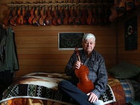 John Arcand, famous Metis fiddler and founder of John Arcand Fiddle Fest in his home outside of Saskatoon, SK on February 27, 2018.