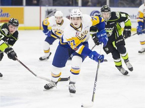 Saskatoon Blades forward Kirby Dach moves the puck during the game at SaskTel Centre in Saskatoon, March 6, 2018.