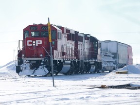 A train drives through Sutherland in Saskatoon, SK on March 7, 2018.