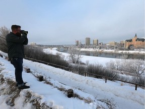 Hobby photographer Derek Daigle takes photos of Saskatoon Tuesday morning with its beautiful fog and hoarfrost on March 13, 2018.