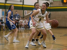 Aden Bowman Bears' Katie Primeau moves the ball against the Walter Murray Marauders during girls city semifinal game action at Aden Bowman Collegiate in Saskatoon, March 14, 2018.