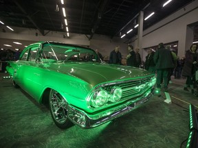 SASKATOON,SK-MARCH 30/2018-0401 Standalone Draggins Car show- People check out a green lit 1960 Chevy Biscayne at the Draggins Car Show at Prairieland Park  in Saskatoon, SK on Friday, March 30, 2017.