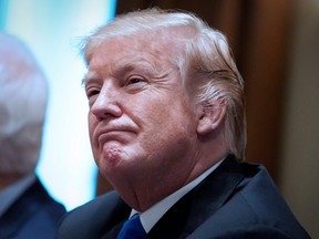 In this file photo taken on February 28, 2018, U.S. President Donald Trump takes part in a meeting with bipartisan members of Congress on school and community safety in the Cabinet Room of the White House in Washington, DC.