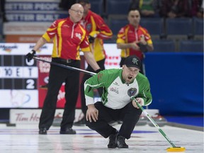 Saskatchewan's Steve Laycock, shown Tuesday against Nunavut, has clinched a championship-round berth in the Brier.