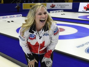 Canada skip Jennifer Jones celebrates their eleventh end win over against Sweden during the gold medal game at the World Women's Curling Championship, Sunday, March 25, 2018 in North Bay, Ont.