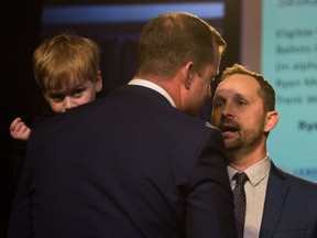 ] Ryan Meili, right, speaks with his leadership race opponent Trent Wotherspoon at the Delta Hotel moments after it was announced that Meili was the winner of the NDP leadership race.