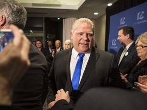 Doug Ford leaves a press conference after being named as the newly elected leader of the Ontario Progressive Conservatives at the delayed Ontario PC Leadership announcement in Markham, Ont., on Saturday, March 10, 2018.