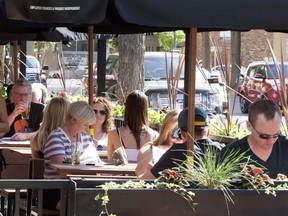 SASKATOON,SK--MARCH 04/2015--People enjoy the sidewalk patio at Hudsons, Thursday, June 04, 2015.