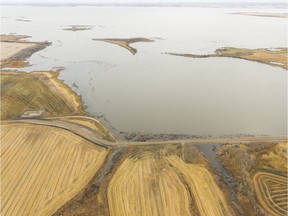 A raised grid road, bottom, lays adjacent the southern end of a former pasture at the Quill Lakes on Oct. 24, 2017. Since water levels began to rise in 2006, the pasture is now entirely underwater.