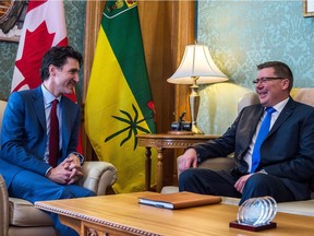Prime Minister Justin Trudeau meets with Premier Scott Moe in the Premier's Office at the legislative building in Regina.