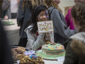 Myka Angela, age 7, with a cake she made for the 1st annual Easter Cake Contest for Kids at the Famers Market in Saskatoon on March 31, 2017.