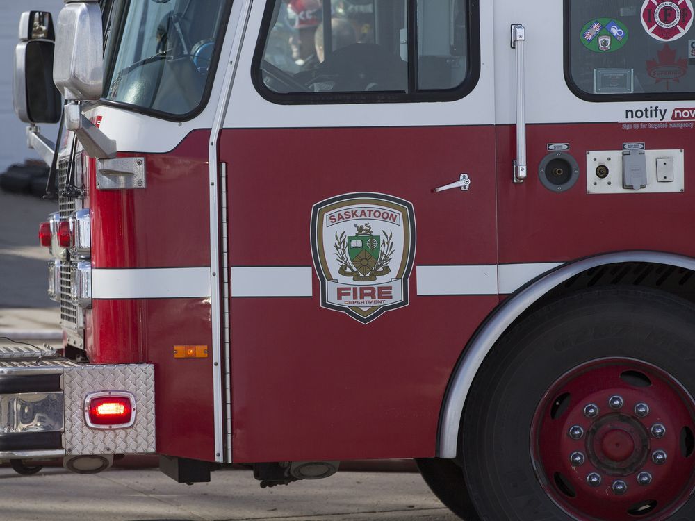 Man in hospital after firefighters rescue him from burning suite
