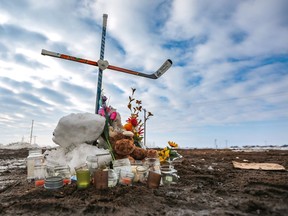 Memorial for the Humboldt Broncos continues to grow at the the scene of Friday's horrific bus crash that killing 16 and injuring 13 others near Tisdale, Saskatchewan. Leah Hennel / Postmedia