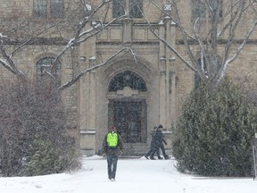 SASKATOON, SK - University of Saskatchewan students walk to class through the morning snowfall on campus in Saskatoon, Sask., on April 11, 2018.