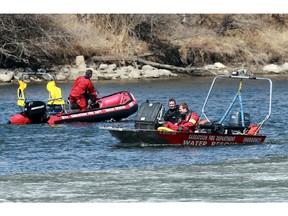 The Saskatoon Fire Department Water Rescue search the river near Gabriel Dumont Park after receiving a report of a person in the river at approximately 11:00 a.m. in Saskatoon, Sask., on April 23, 2018.
