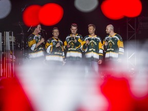 An in-camera double exposure of the Hunter Brothers singing the National Anthem at the Country Thunder Humboldt Broncos Tribute in Saskatoon, SK on Friday, April 27, 2018.