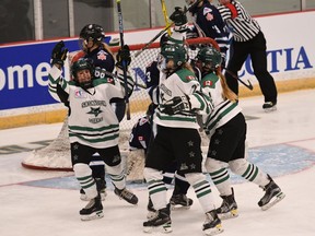 Cutline: Calli Arnold of the Saskatoon Stars celebrates with her teammates after scoring against the Brampton Canadettes at the Esso Cup in Bridgewater, N.S. on Sunday, April 22. The Stars won 5-0.