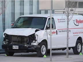 The front end damage of the van that the driver used to hit several pedestrians in Toronto, Ontario, on Monday on April 23, 2018.  At least nine people were killed and 16 others wounded Monday when a driver rammed his rental van into a crowd of pedestrians in downtown Toronto, police said, without revealing a possible motive."This is going to be a complex investigation," deputy police chief Peter Yuen told reporters. "We have one person in custody and the investigation is ongoing.""We can confirm for you tonight right now we have nine people that are dead, 16 injured," Yuen said.