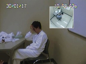 Police interview Alexandre Bissonnette on January 30, 2017, the day after the mosque attacks, in this still from an interrogation video shown by the Crown to the sentencing hearings in Quebec City in this handout photo.