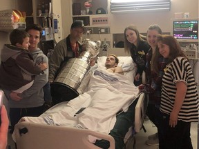 Tom Straschnitzki, whose son Ryan Straschnitzki was badly injured in the April 6, 2018, crash of the Humboldt Broncos bus, posted a photo to Twitter of when the Stanley Cup was brought to the bedsides of the team members who are in Saskatoon's Royal University Hospital on April 13, 2018.