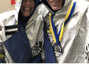 Regina's Jennifer and Vern Masur bundled up after completing the Boston Marathon in frigid conditions on Monday. Photo courtesy of Jennifer Masur.