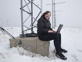 Lindsay Goodwin at the U of S "SuperDARN" radar site, one of 40 radars worldwide collecting data on the impact of solar activity.