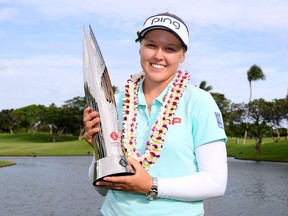 Brooke Henderson celebrates her win at the LOTTE Championship in Kapolei, Hawaii, on April 14.