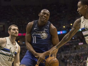 Orlando Magic centre Bismack Biyombo is defended by the Milwaukee Bucks on April 9.