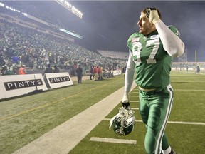 Former Saskatchewan Roughriders defensive end John Chick, who announced his retirement from football on Friday, walks off the field after a 2013 playoff victory over the B.C. Lions.
