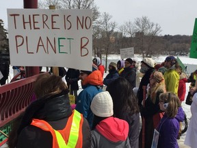 Protesters at Saskatoon's March for Science gathered at the Chinese Ting in Victoria Park before marching through downtown to bring awareness to the need for scientific and evidence based approaches to policy making on April 14, 2018. (Erin Petrow/ Saskatoon StarPhoenix)