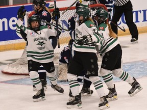 Calli Arnold celebrates with her Saskatoon Stars' teammates during Esso Cup tournament action at Bridgewater, N.S.